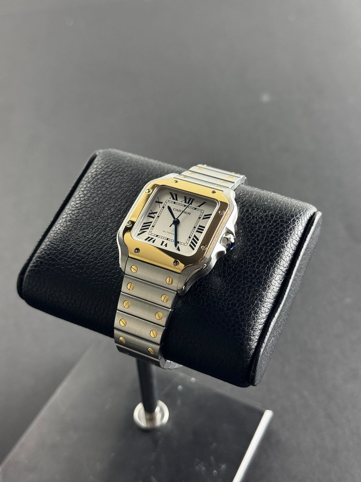 Cartier Santos de Cartier in steel and yellow gold with white dial and Roman numerals