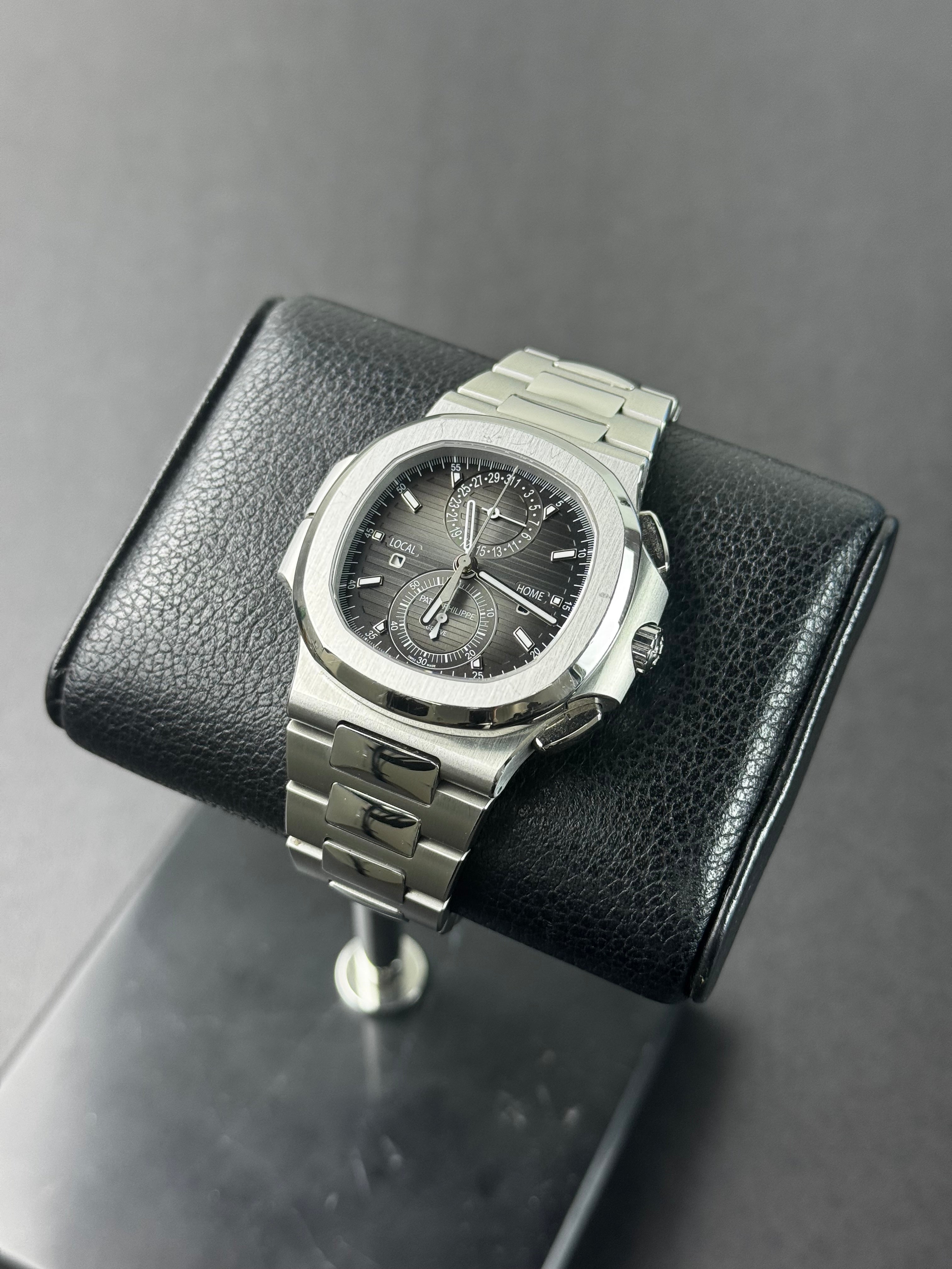 Patek Philippe Nautilus stainless steel set in an open case, available via broker in Canada