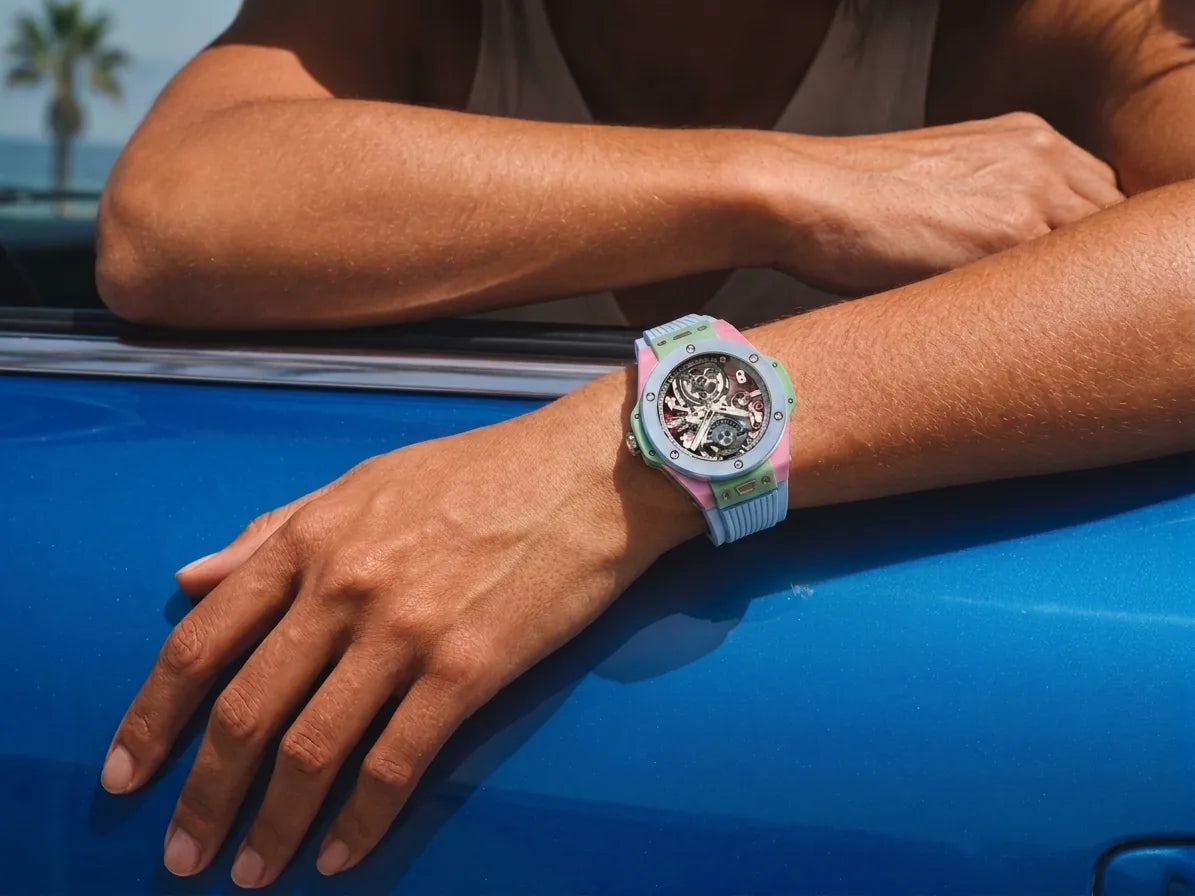 Hublot Big Bang ceramic chronograph watch on a rubber strap worn on the wrist